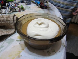 Butterscotch pudding with whipped cream